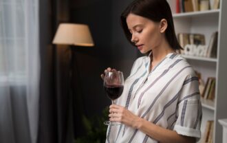 Woman with a glass of wine